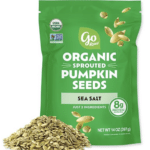 Image of a package of Go Raw Organic Sprouted Pumpkin Seeds and a small pile of pumpkin seeds